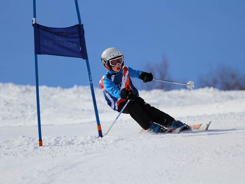 Children racing on their family holiday